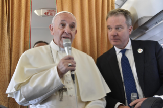 3-Apostolic Visit to Ireland: Greeting to journalists on the flight to Ireland