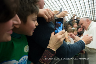 1-À l'Association nationale italienne des familles nombreuses (28 décembre 2014)