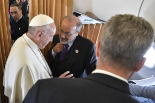 4-Apostolic Visit to Ireland: Greeting to journalists on the flight to Ireland