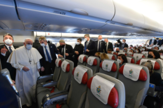 0-Apostolic Journey to the Republic of Iraq: Greeting to journalists on the flight to Iraq