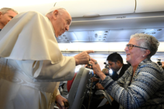 1-Apostolic Journey to Canada: Greeting to journalists on the flight to Canada