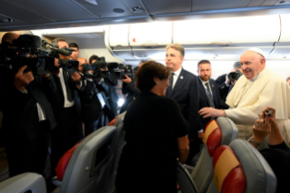 3-Apostolic Journey to Canada: Greeting to journalists on the flight to Canada